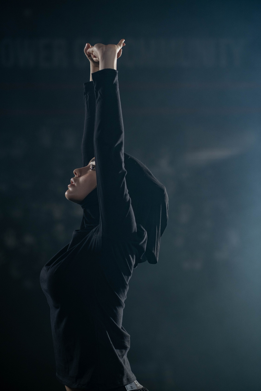 Woman in Black Activewear Exercising